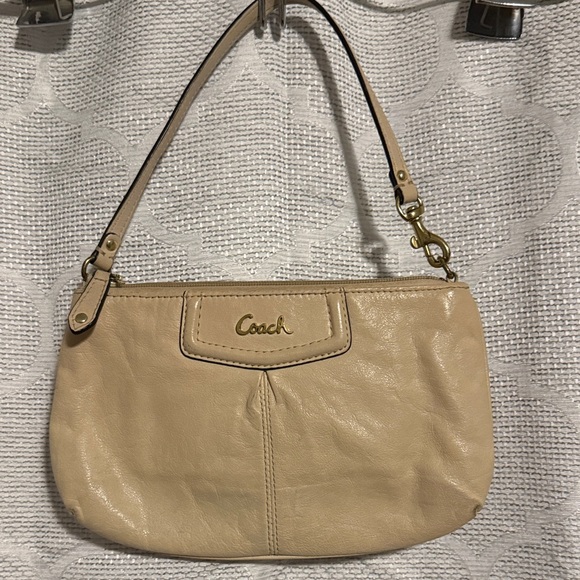 Coach Handbags - Coach Beige Leather Wristlet